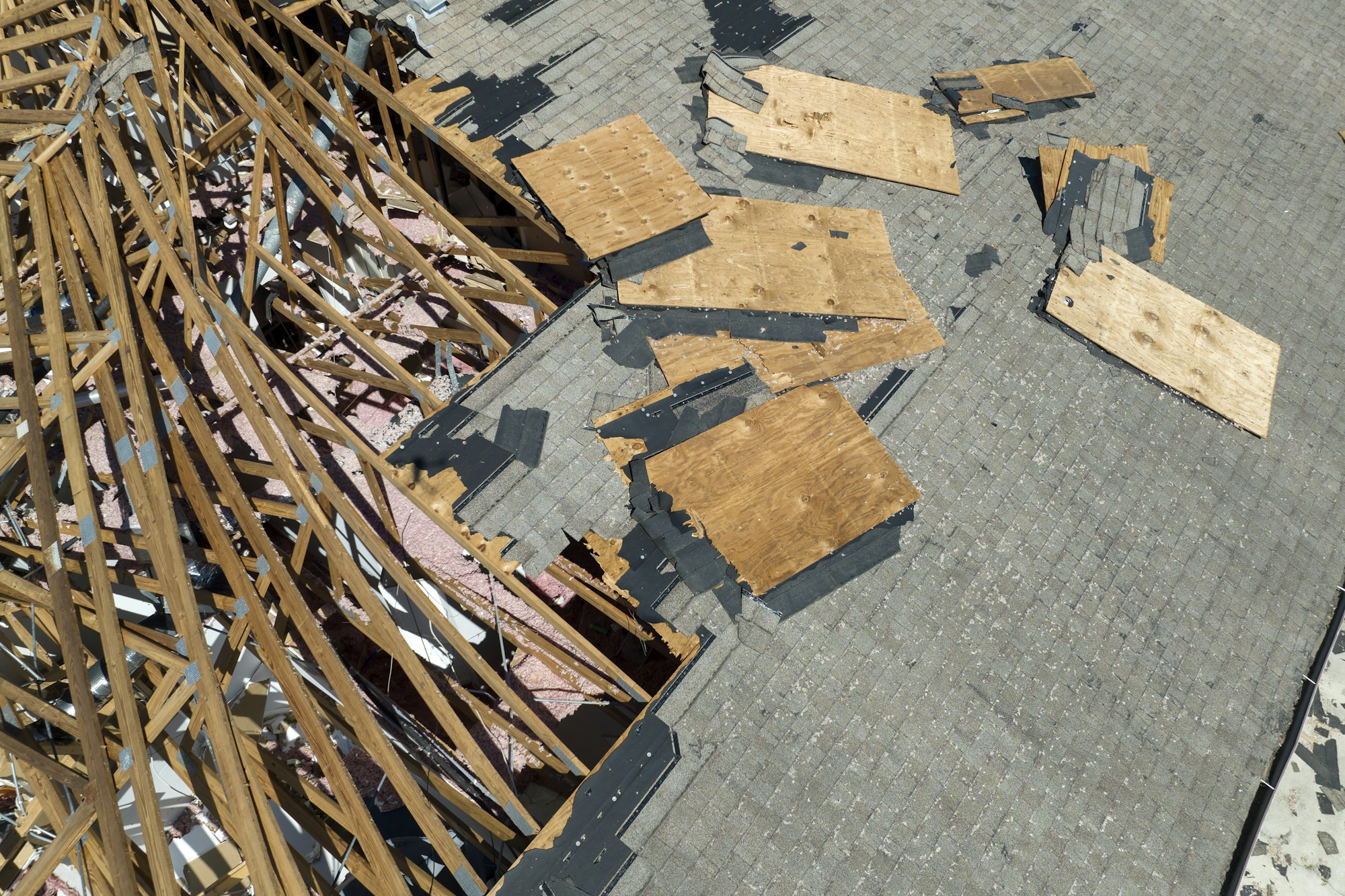 Natural disaster and its consequences. Hurricane Ian destroyed house roof in Florida