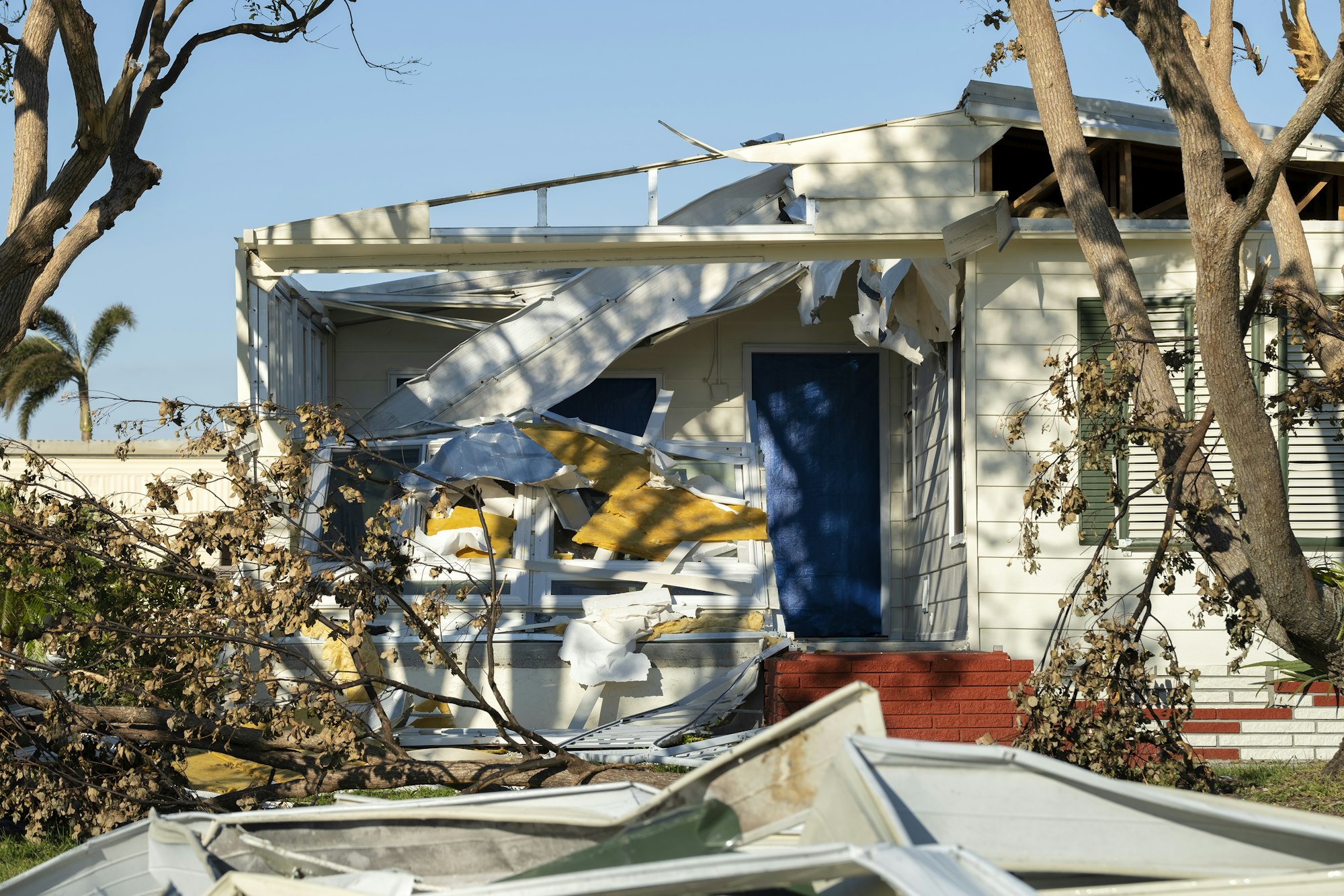 Property damage from strong hurricane winds.